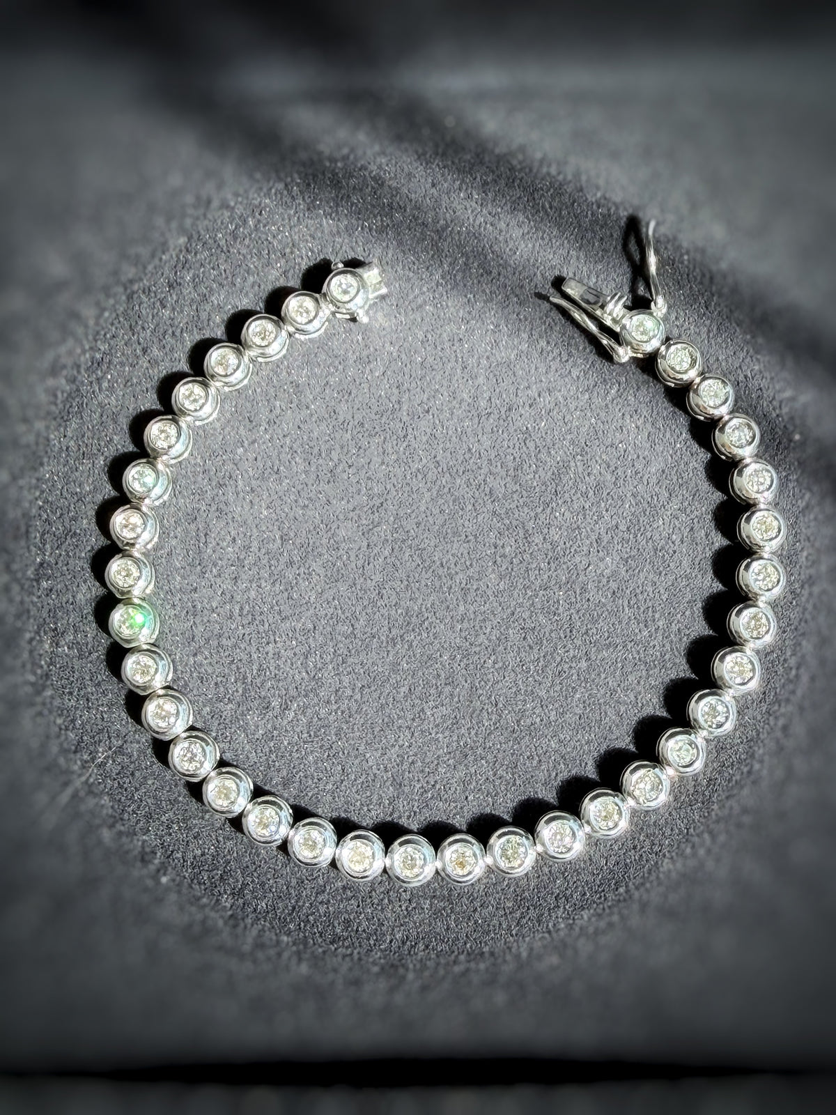 18K WHITE GOLD TENNIS BRACELET 7 1/4”
