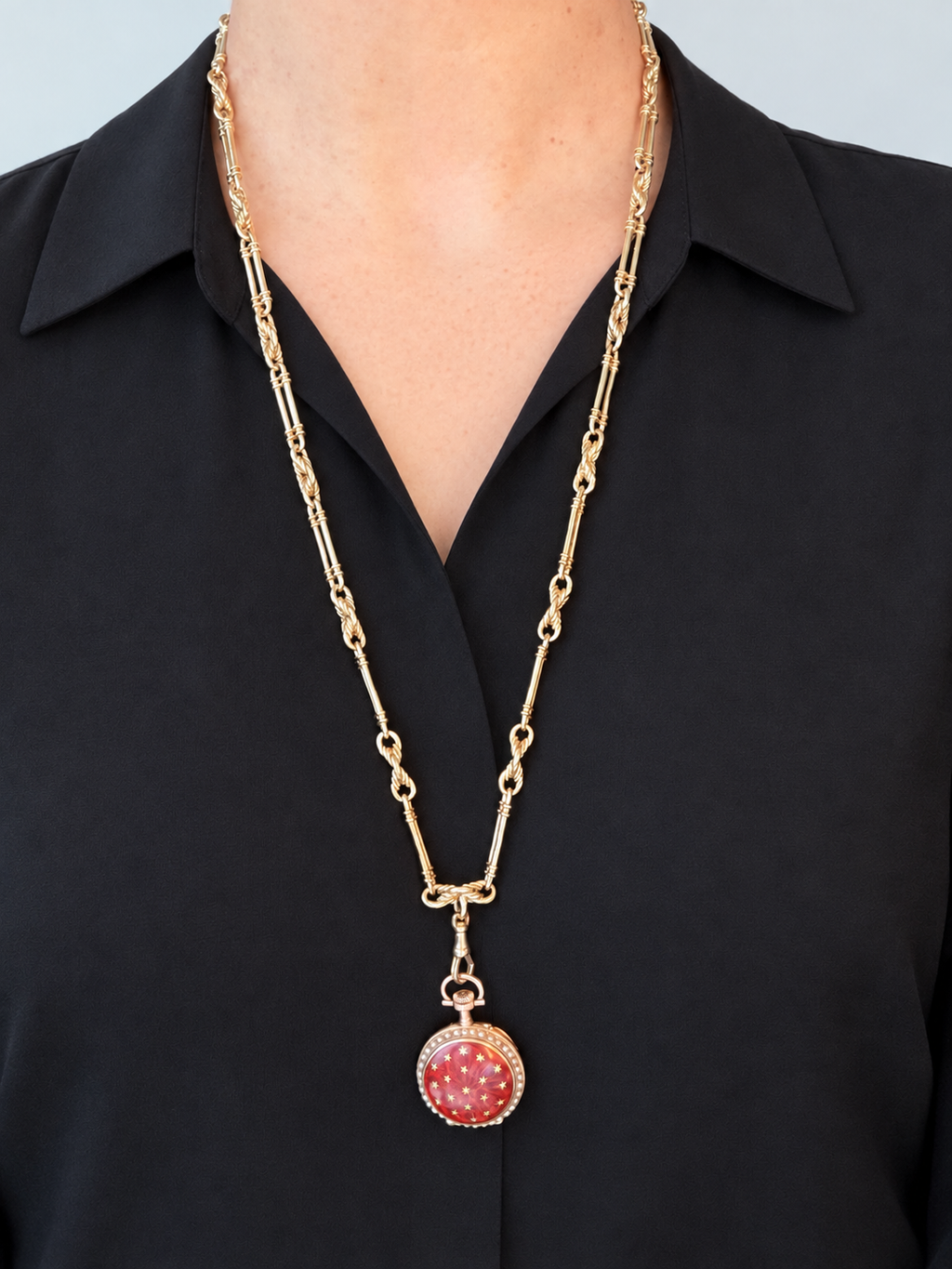 9CT GOLD TROMBONE & LOVER'S
KNOT LONG GUARD CHAIN